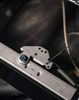 Close-up of the adjustment mechanism and spring on a PRP seat slider for Can-Am