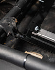 Close-up of PRP seat slider mount installed in a Can-Am, showing hardware and attachment point