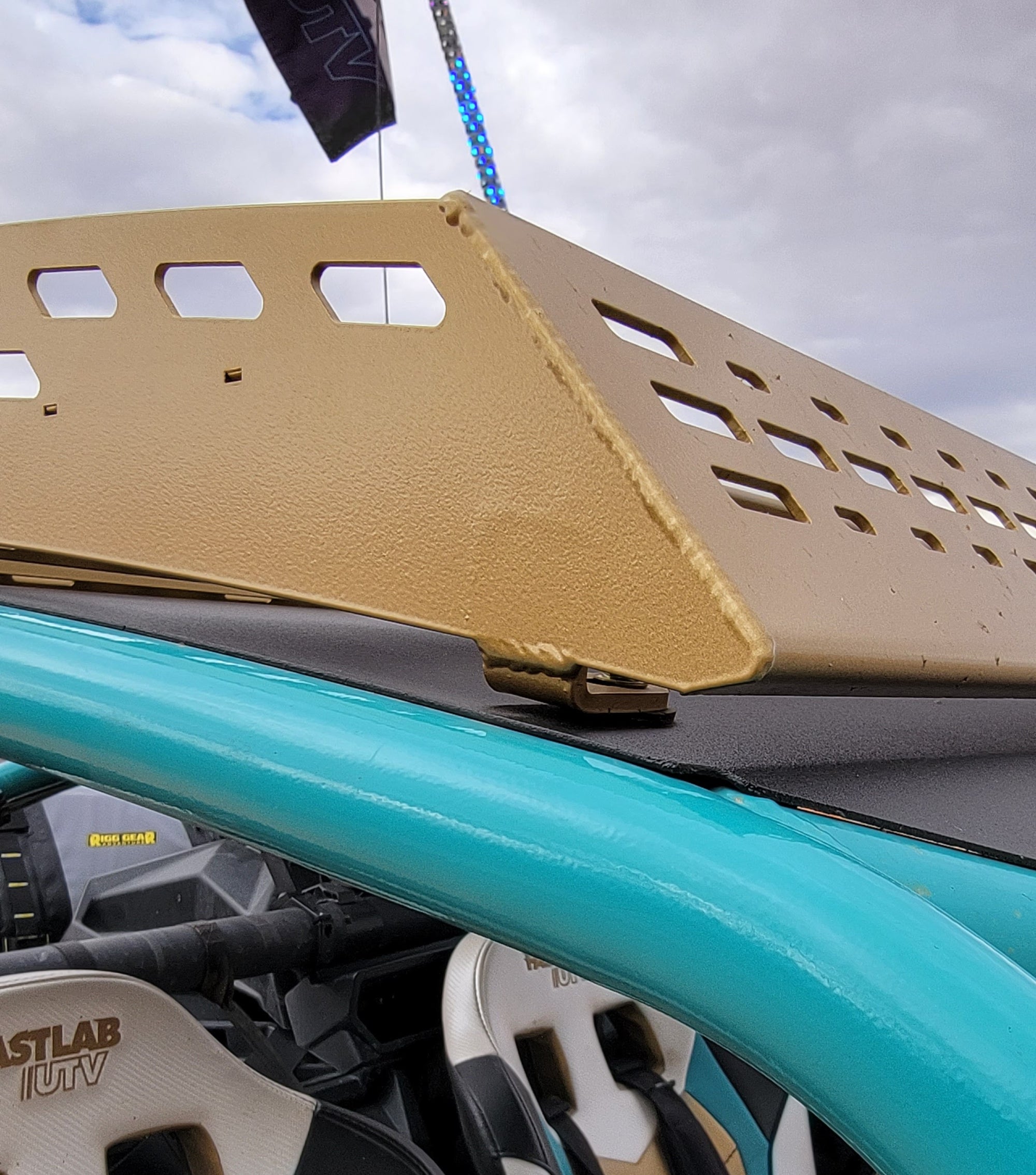 Top view of Can-Am X3 DIY roof rack mounted on radius roll cage