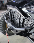 Close-up of Fastlab winch bumper installed on a Polaris RZR with a red tow strap