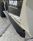 Rock slider steps on a Polaris RZR 4-seat with FastLab branding.