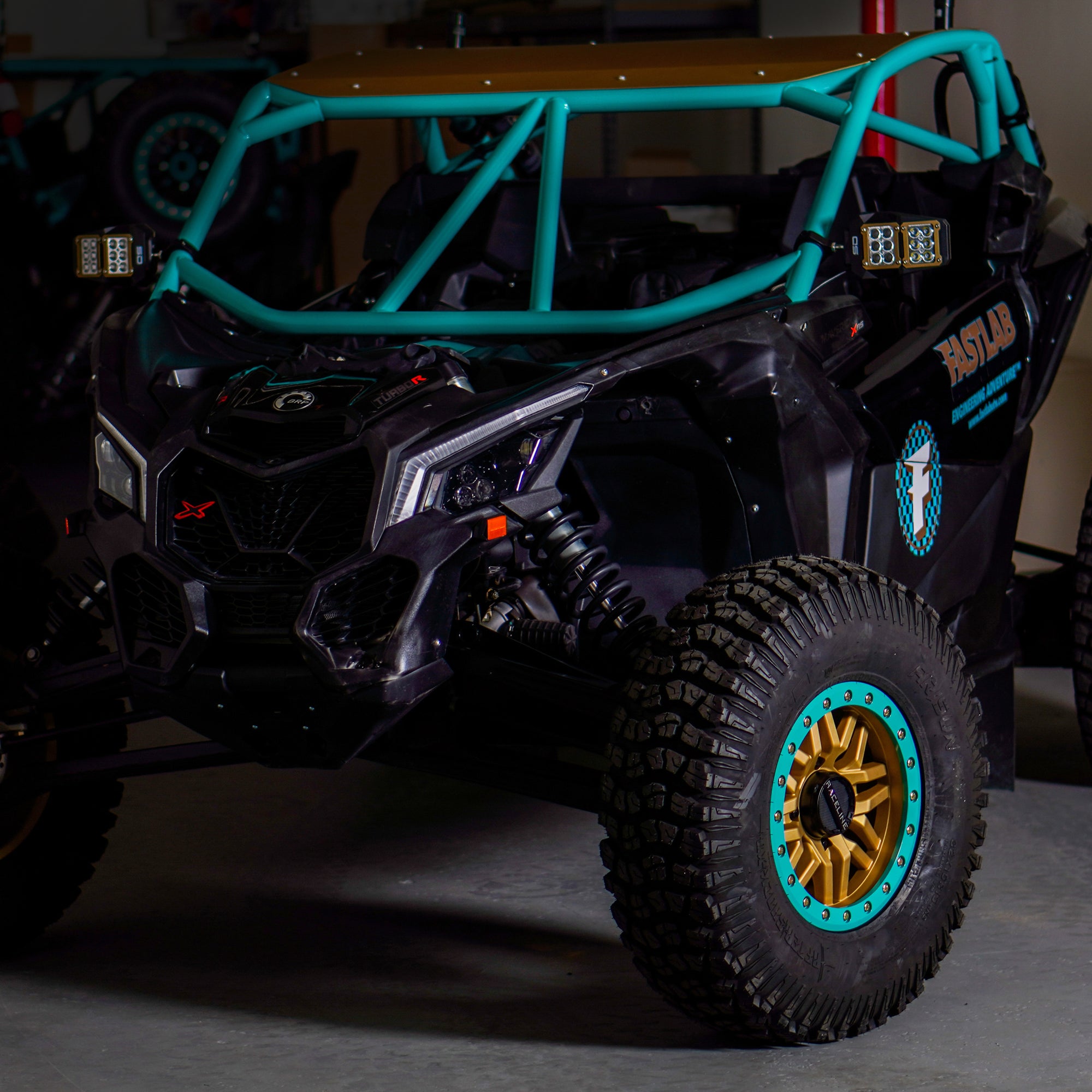 LSK Can-Am X3 Radius Roll Cage Kit on car Turquoise